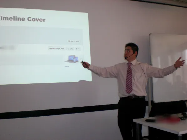 Wilson Tiong presenting a social media slide during a training session in 2013